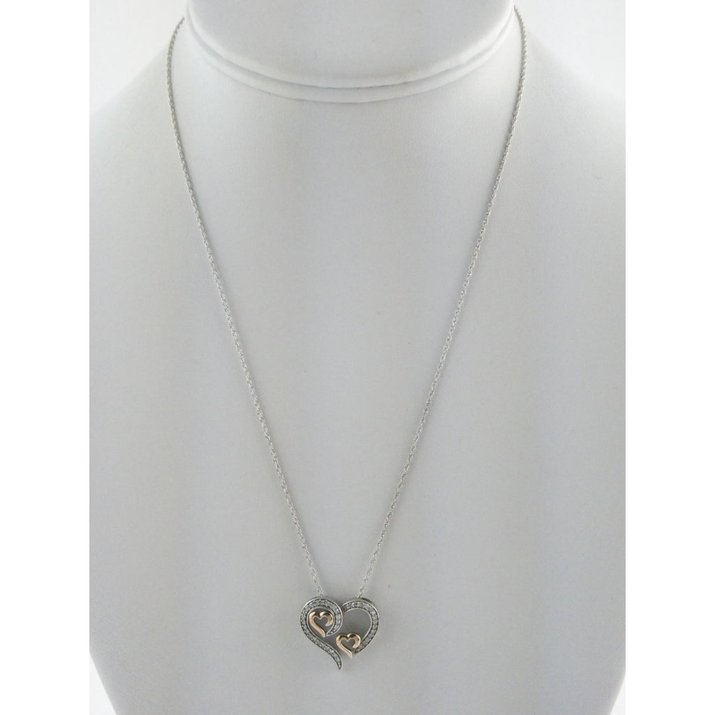 CO Sterling Silver and 10k Gold Natural Diamond Three Hearts Pendant Necklace