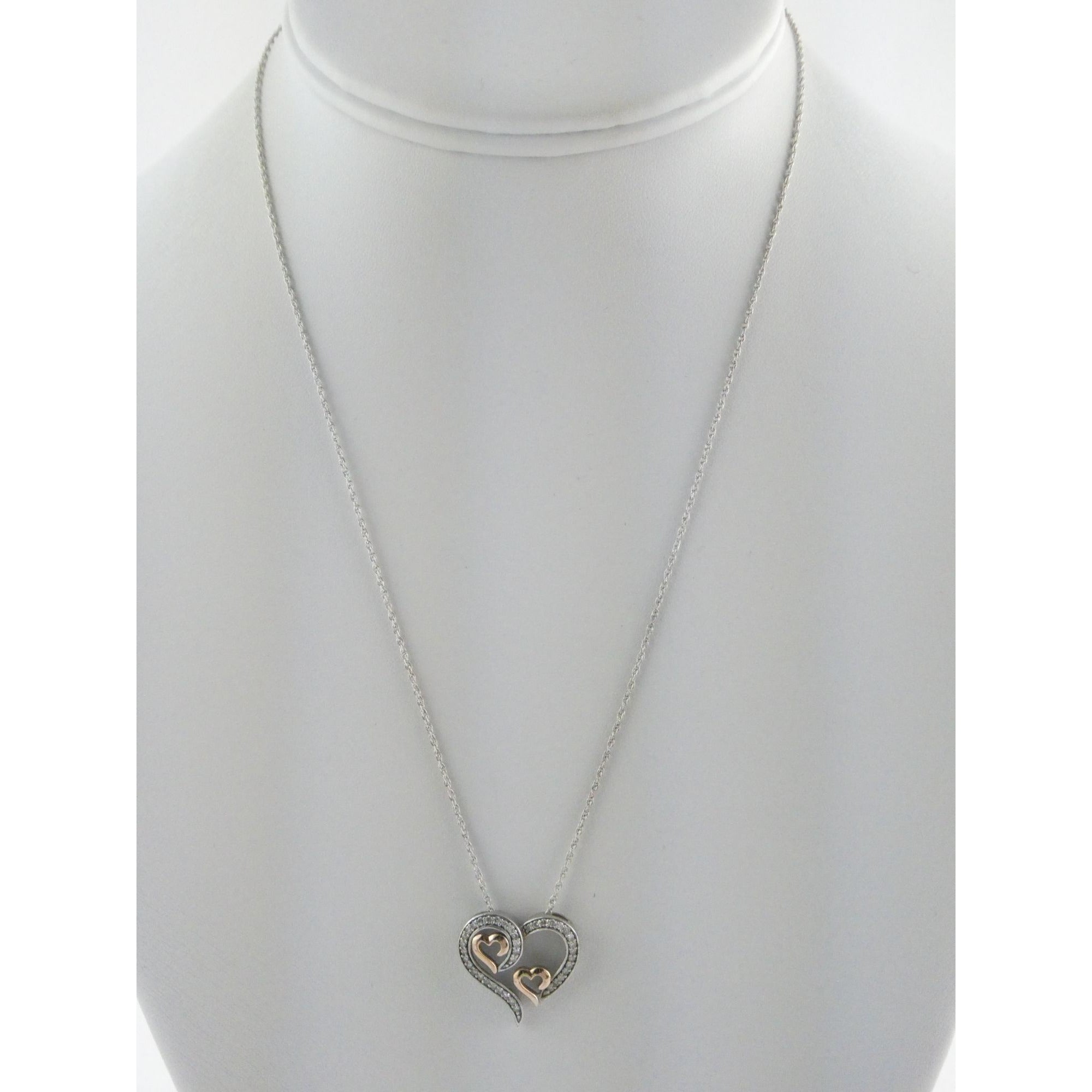 CO Sterling Silver and 10k Gold Natural Diamond Three Hearts Pendant Necklace