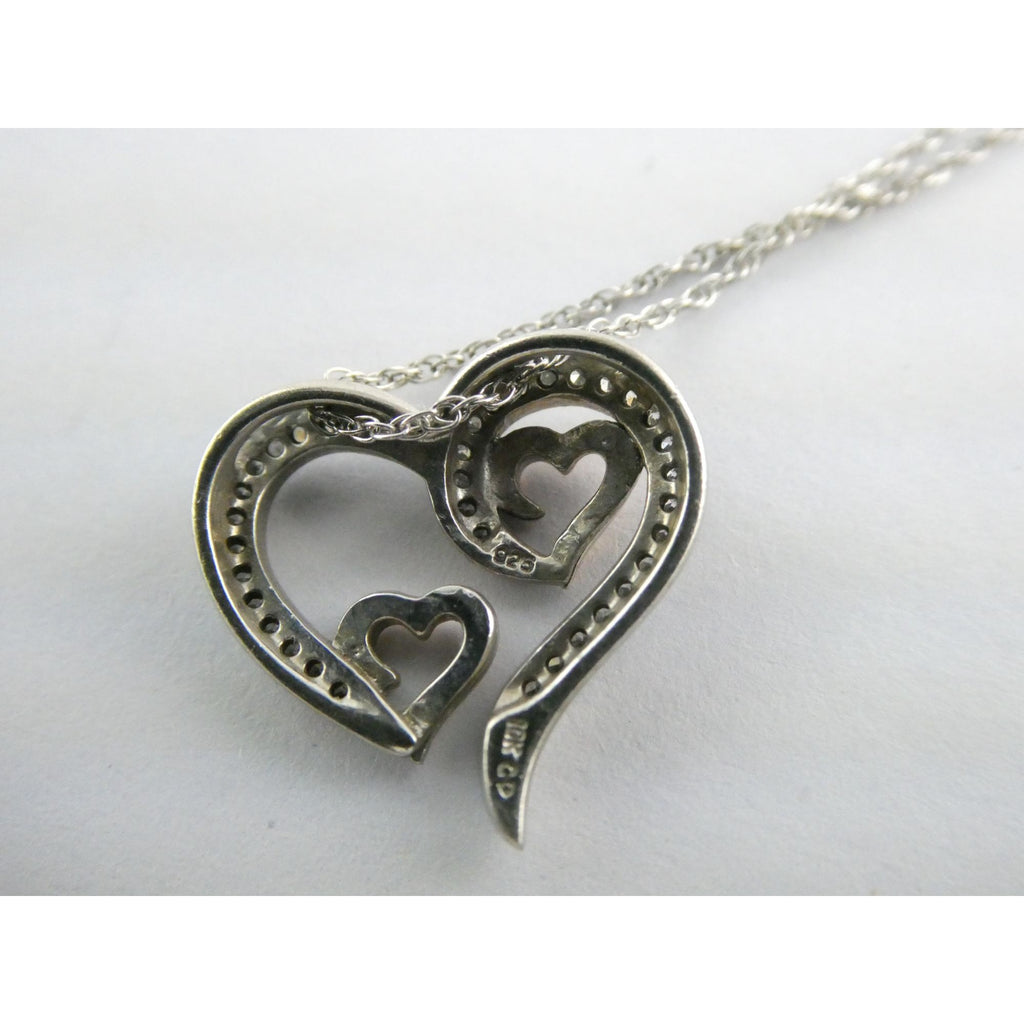 CO Sterling Silver and 10k Gold Natural Diamond Three Hearts Pendant Necklace