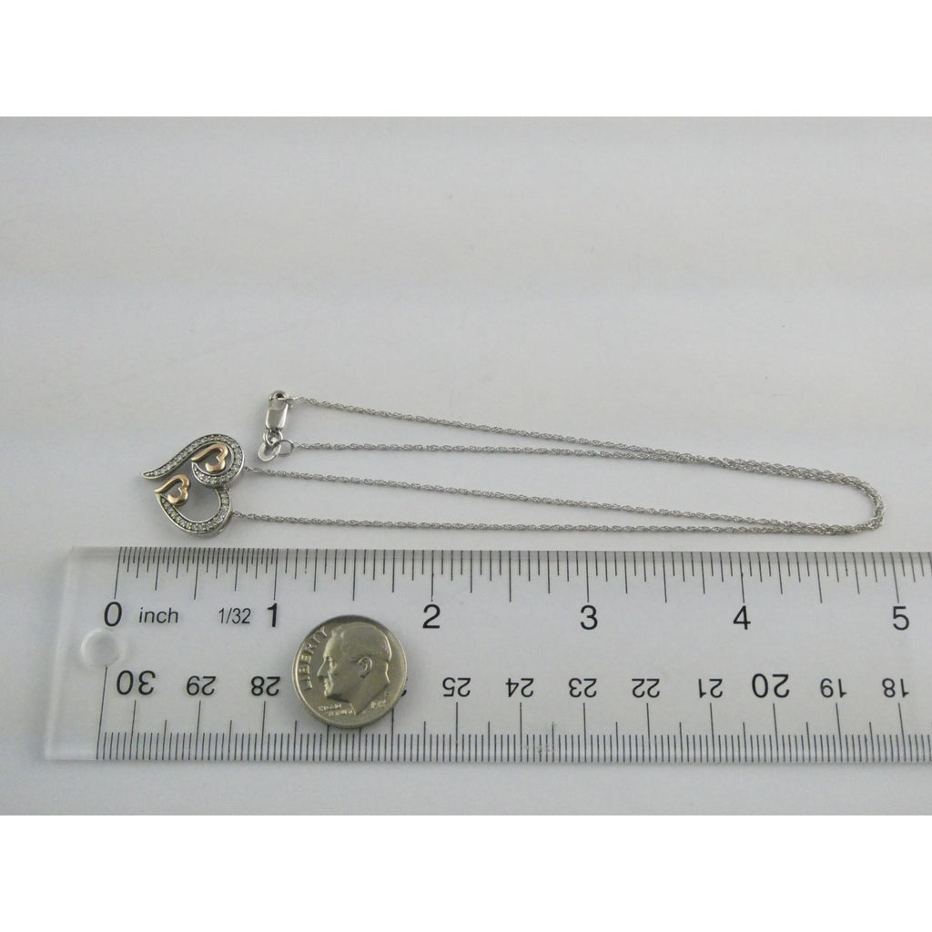 CO Sterling Silver and 10k Gold Natural Diamond Three Hearts Pendant Necklace