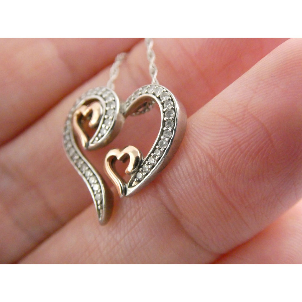 CO Sterling Silver and 10k Gold Natural Diamond Three Hearts Pendant Necklace