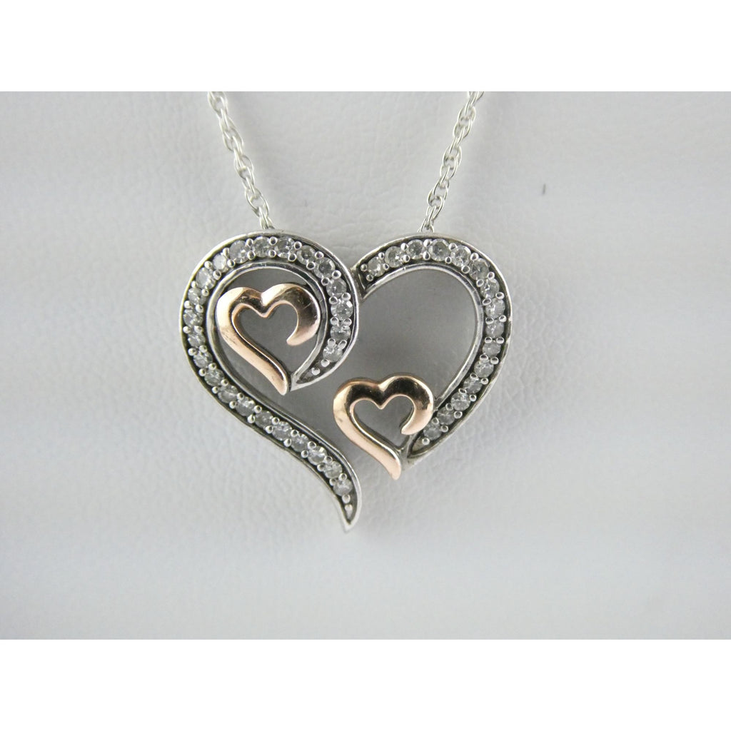 CO Sterling Silver and 10k Gold Natural Diamond Three Hearts Pendant Necklace