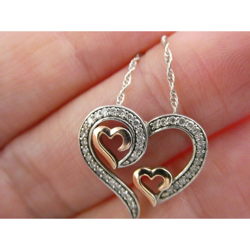 CO Sterling Silver and 10k Gold Natural Diamond Three Hearts Pendant Necklace