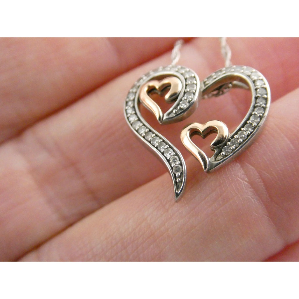 CO Sterling Silver and 10k Gold Natural Diamond Three Hearts Pendant Necklace