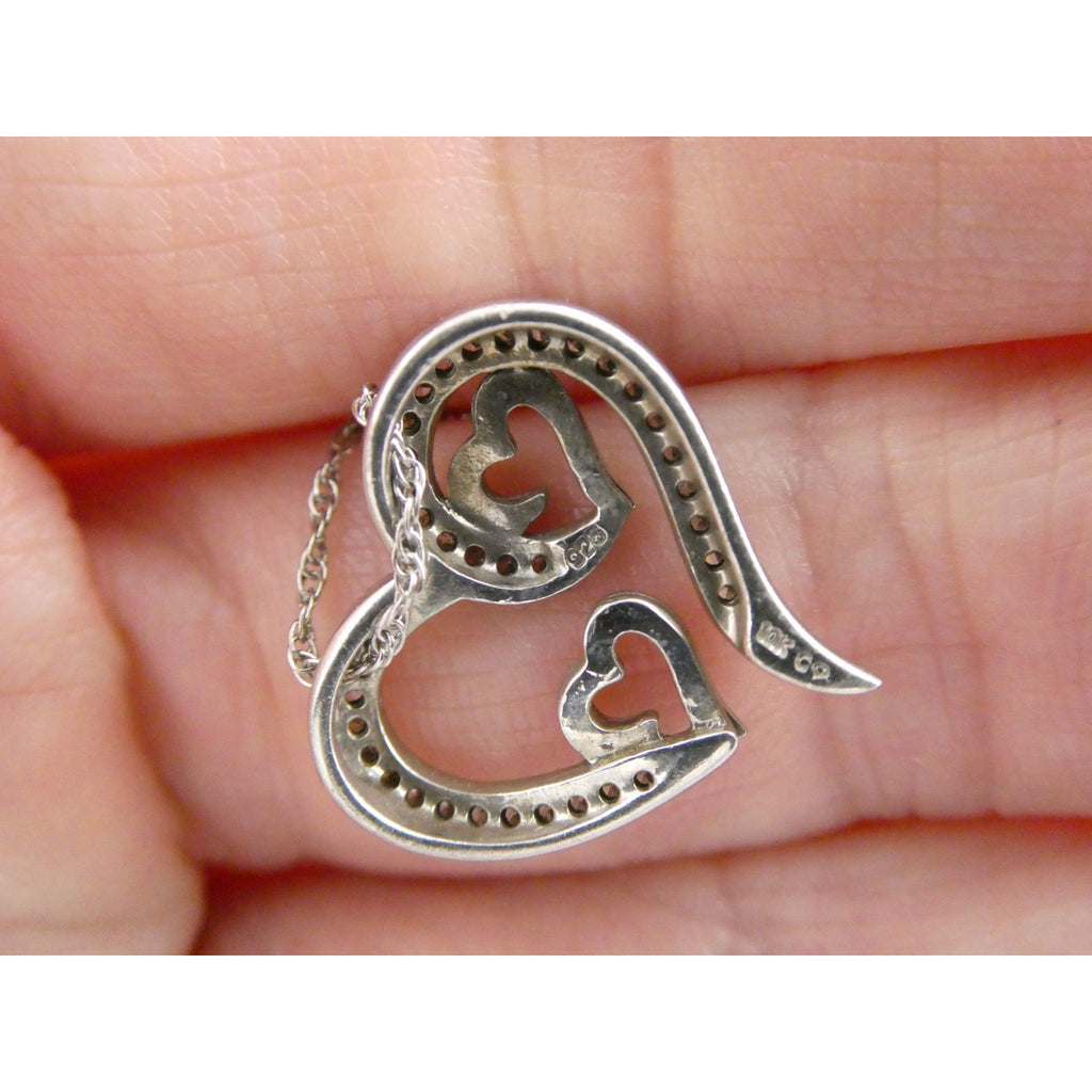 CO Sterling Silver and 10k Gold Natural Diamond Three Hearts Pendant Necklace