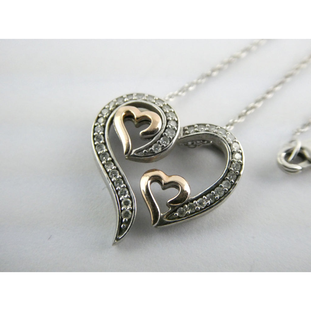 CO Sterling Silver and 10k Gold Natural Diamond Three Hearts Pendant Necklace