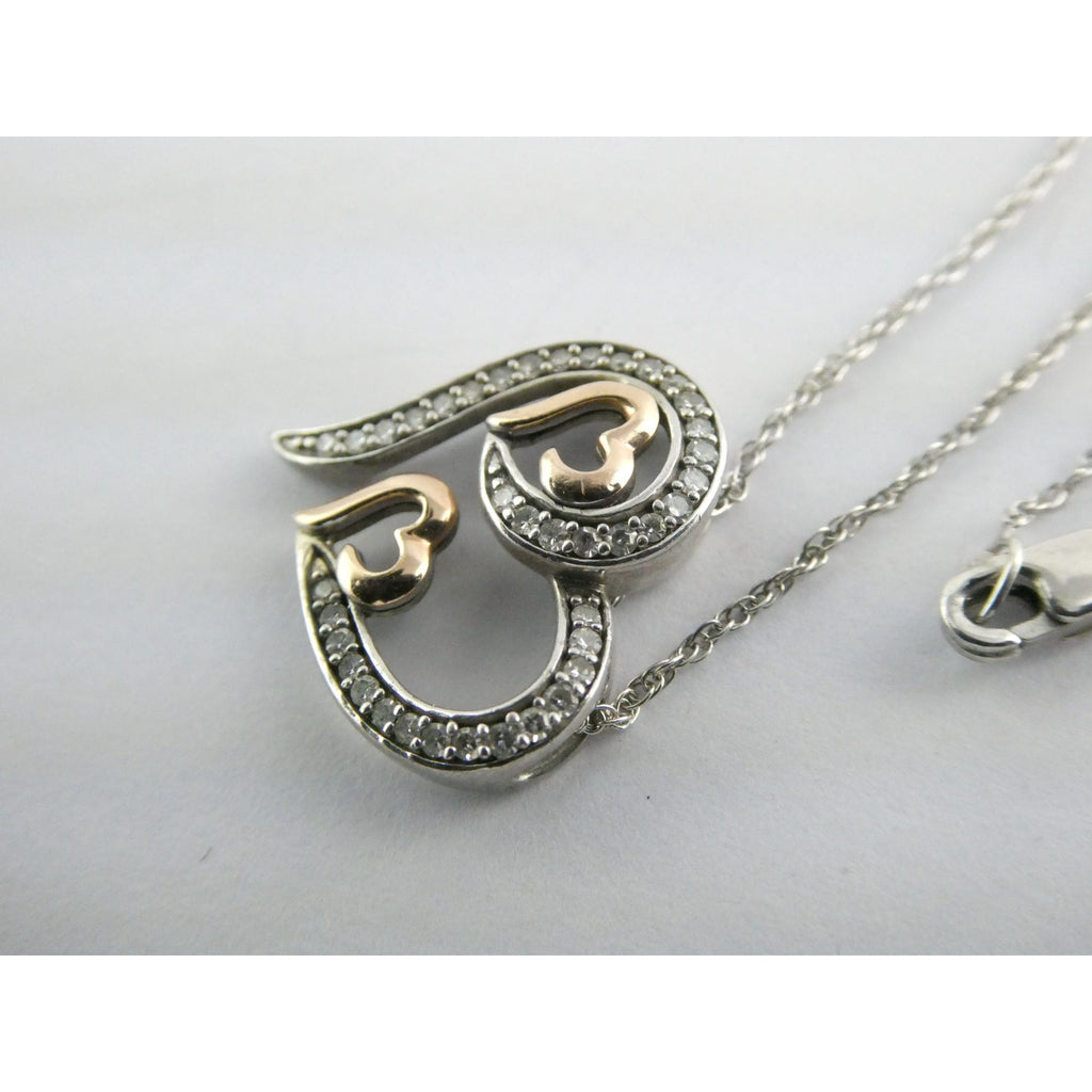 CO Sterling Silver and 10k Gold Natural Diamond Three Hearts Pendant Necklace
