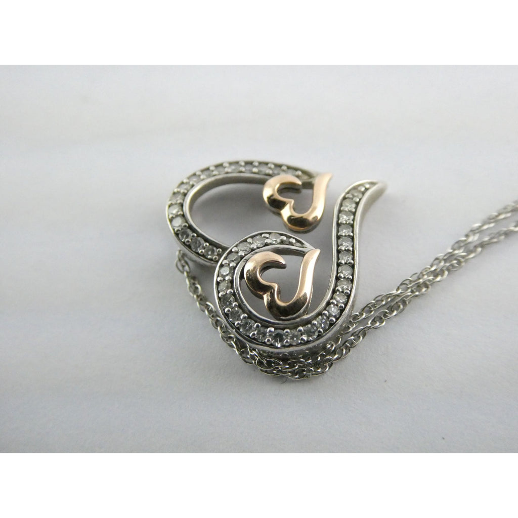 CO Sterling Silver and 10k Gold Natural Diamond Three Hearts Pendant Necklace