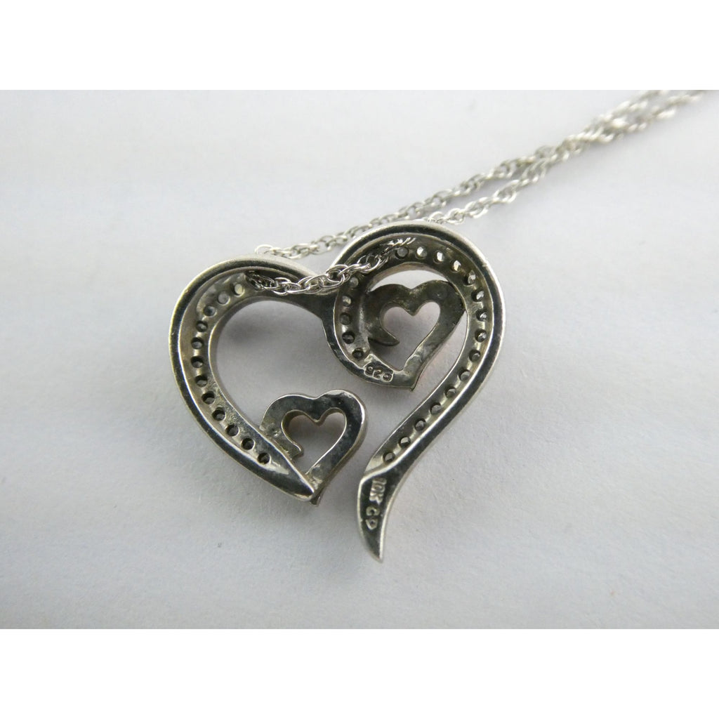 CO Sterling Silver and 10k Gold Natural Diamond Three Hearts Pendant Necklace